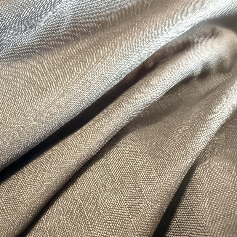 Primer plano del tejido de la manta de caballo 600D. Textura ripstop estándar, impermeable y transpirable para uso regular en exterior.